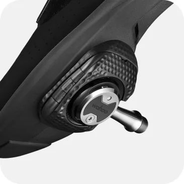 Side profile view showing seamless aerodynamic integration between the power pedal and the cleat